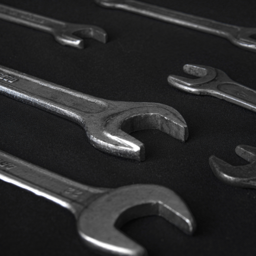 What are alloy steel grades and their properties