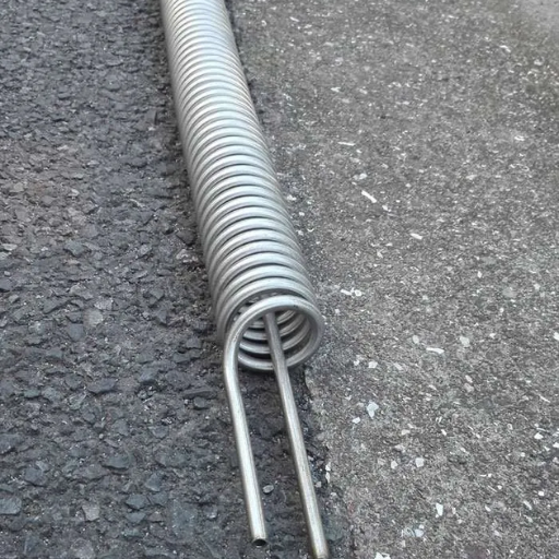 How does stainless steel perform as a heat exchanger material
