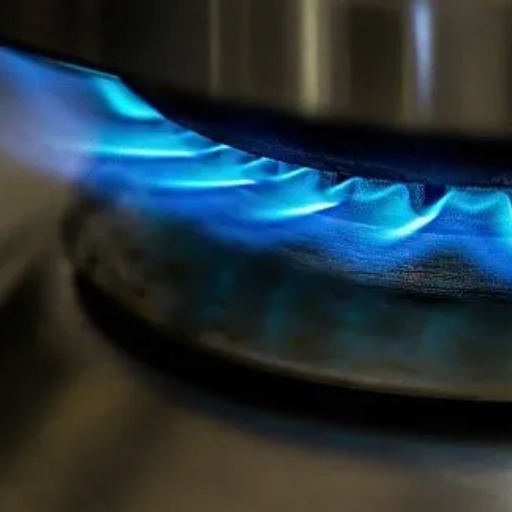 How does stainless steel's heat conductivity compare to other metals